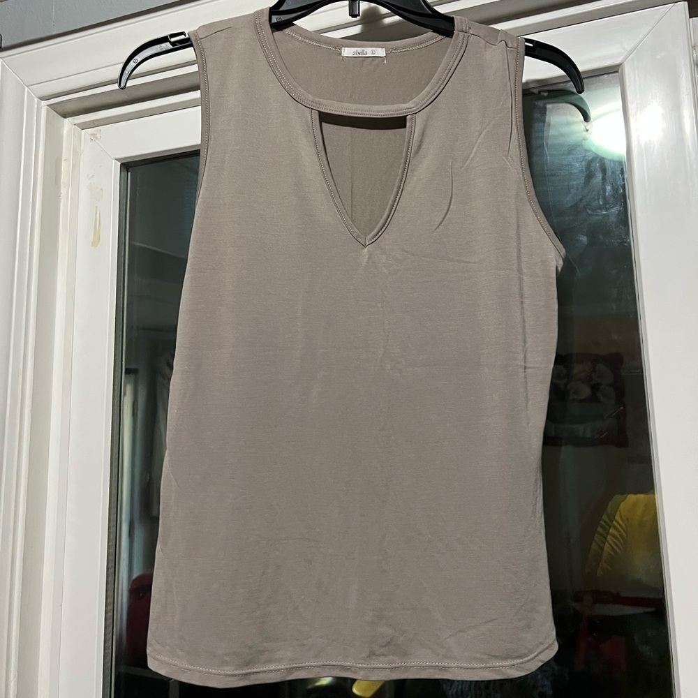 Cream/brown colored blouse style tank top, soft and silky. Size Large. Worn once